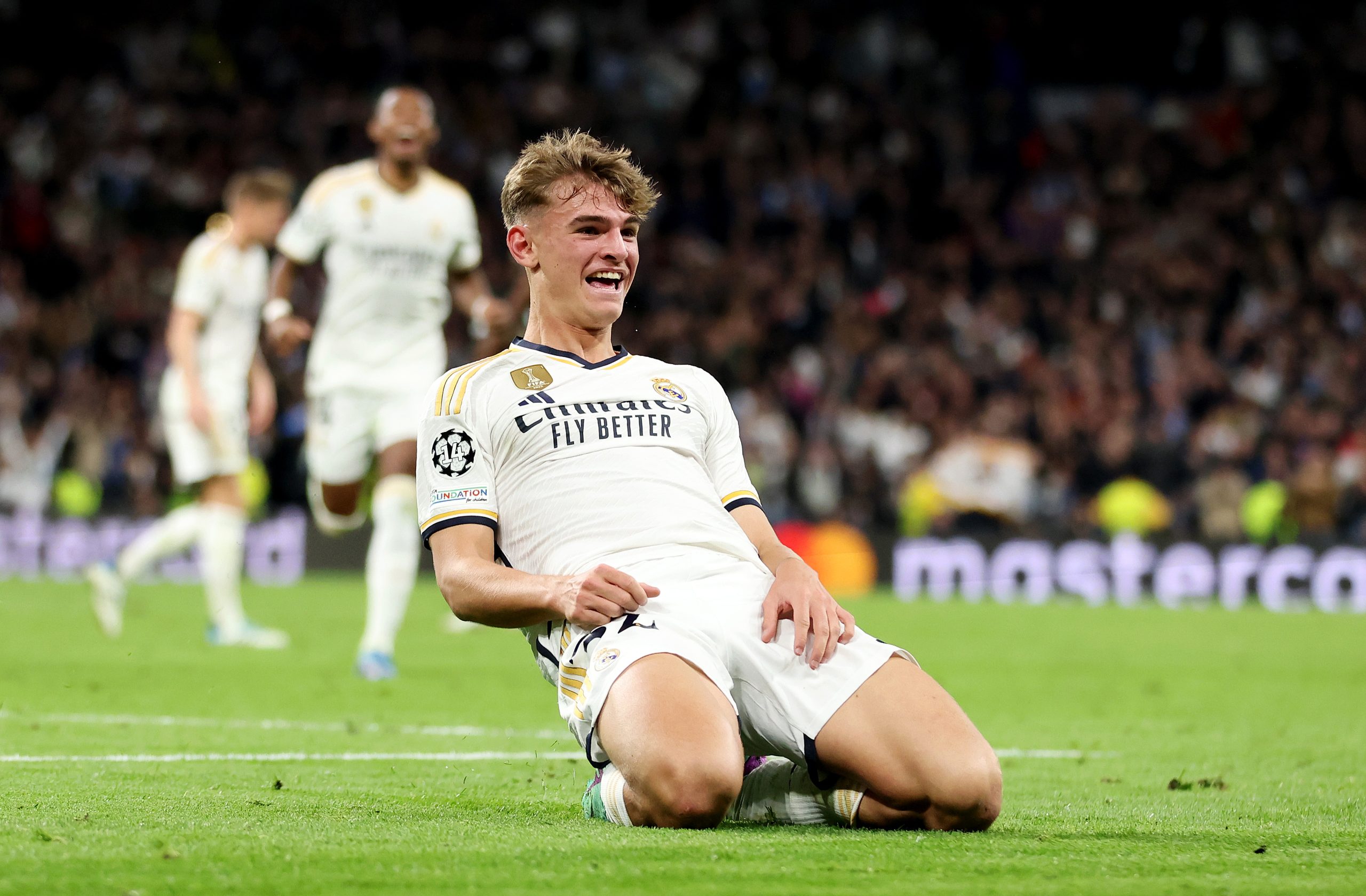 MADRID, SPAIN - NOVEMBER 29: Nico Paz of Real Madrid celebrates after scoring the team's third goal during the UEFA Champions League match between Real Madrid and SSC Napoli at Estadio Santiago Bernabeu on November 29, 2023 in Madrid, Spain. (Photo by Florencia Tan Jun/Getty Images)