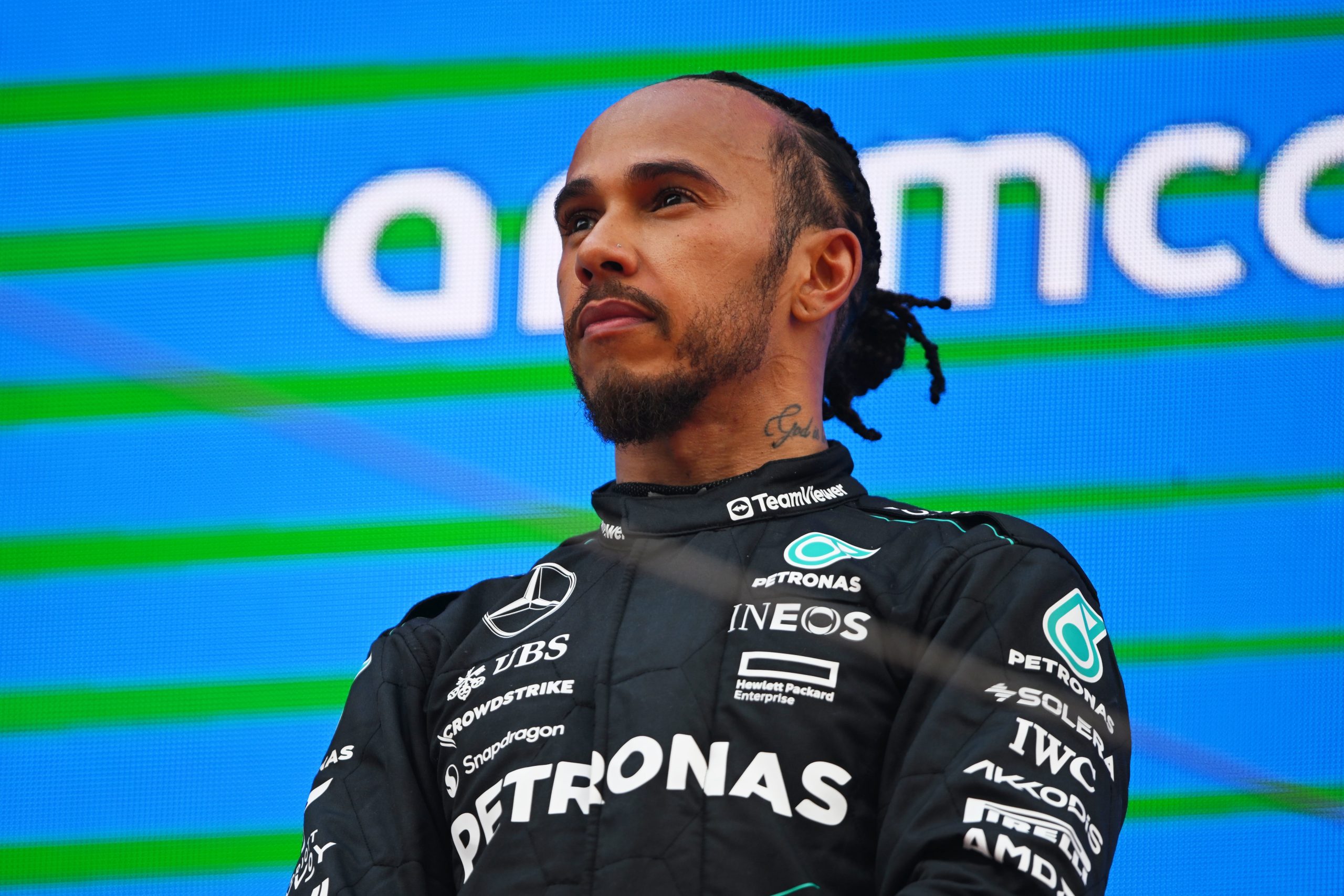 BARCELONA, SPAIN - JUNE 23: Third placed Lewis Hamilton of Great Britain and Mercedes stands on the podium after the F1 Grand Prix of Spain at Circuit de Barcelona-Catalunya on June 23, 2024 in Barcelona, Spain. (Photo by Rudy Carezzevoli/Getty Images)
