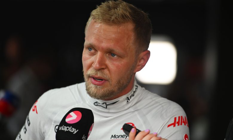 SPIELBERG, AUSTRIA - JUNE 30: 8th placed Kevin Magnussen of Denmark and Haas F1 talks to the media in the Paddock after the F1 Grand Prix of Austria at Red Bull Ring on June 30, 2024 in Spielberg, Austria. (Photo by Rudy Carezzevoli/Getty Images)