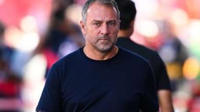 GIRONA, SPAIN - SEPTEMBER 15: Hansi Flick, Head Coach of FC Barcelona, looks on during the LaLiga match between Girona FC and FC Barcelona at Montilivi Stadium on September 15, 2024 in Girona, Spain. (Photo by David Ramos/Getty Images)