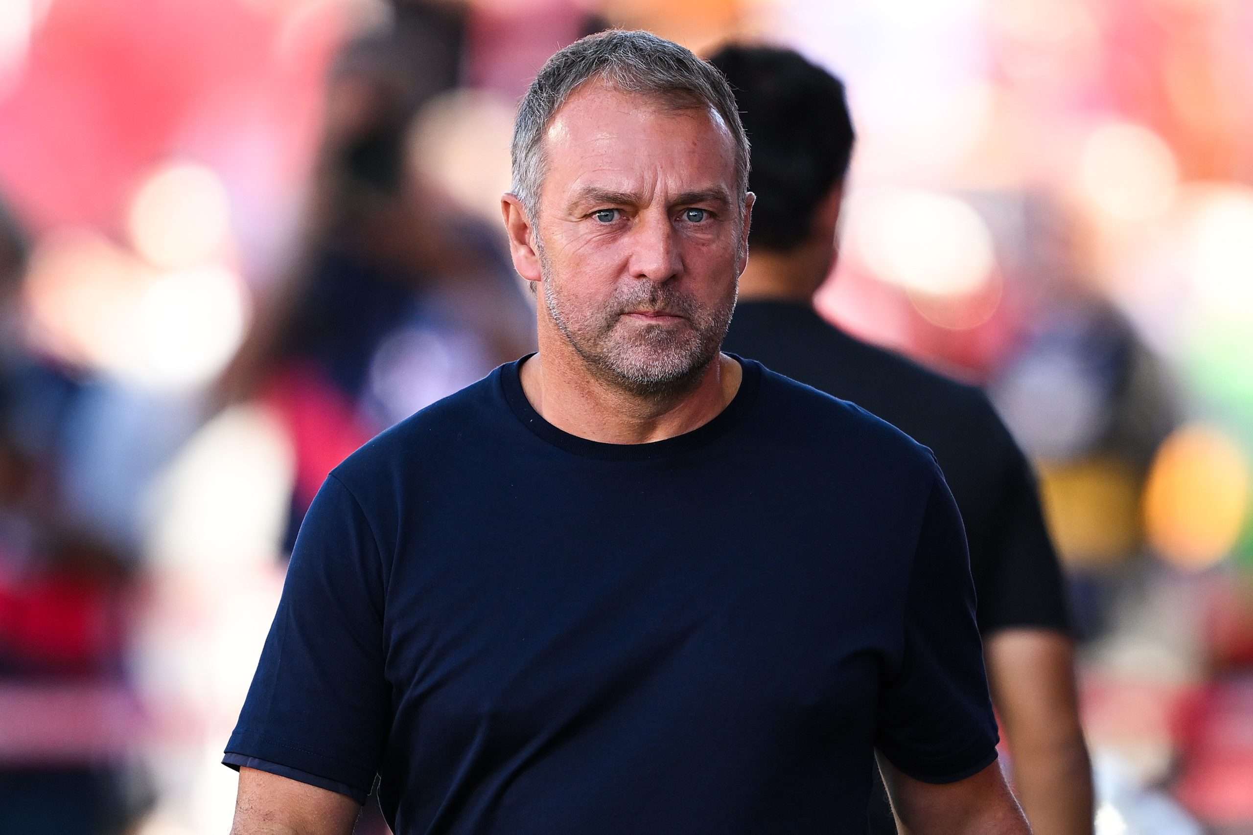 GIRONA, SPAIN - SEPTEMBER 15: Hansi Flick, Head Coach of FC Barcelona, looks on during the LaLiga match between Girona FC and FC Barcelona at Montilivi Stadium on September 15, 2024 in Girona, Spain. (Photo by David Ramos/Getty Images)