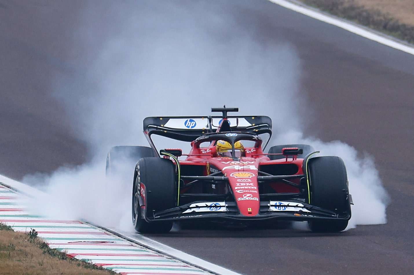 FIORANO MODENESE, ITALY - JANUARY 22: Lewis Hamilton of Great Britain driving the (44) Ferrari SF-23 locks a wheel under braking during his first official days as a Scuderia Ferrari F1 driver at Fiorano Circuit on January 22, 2025 in Fiorano Modenese, Italy. (Photo by Clive Rose/Getty Images)