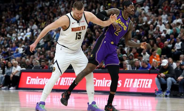 DENVER, COLORADO - FEBRUARY 22: Nikola Jokic #15 of the Denver Nuggets jockeys for position against Jarred Vanderbilt #2 of the Los Angels Lakers in the first quarter at Ball Arena on February 22, 2025 in Denver, Colorado. NOTE TO USER: User expressly acknowledges and agrees that, by downloading and or using this photograph, User is consenting to the terms and conditions of the Getty Images License Agreement. (Photo by Matthew Stockman/Getty Images)