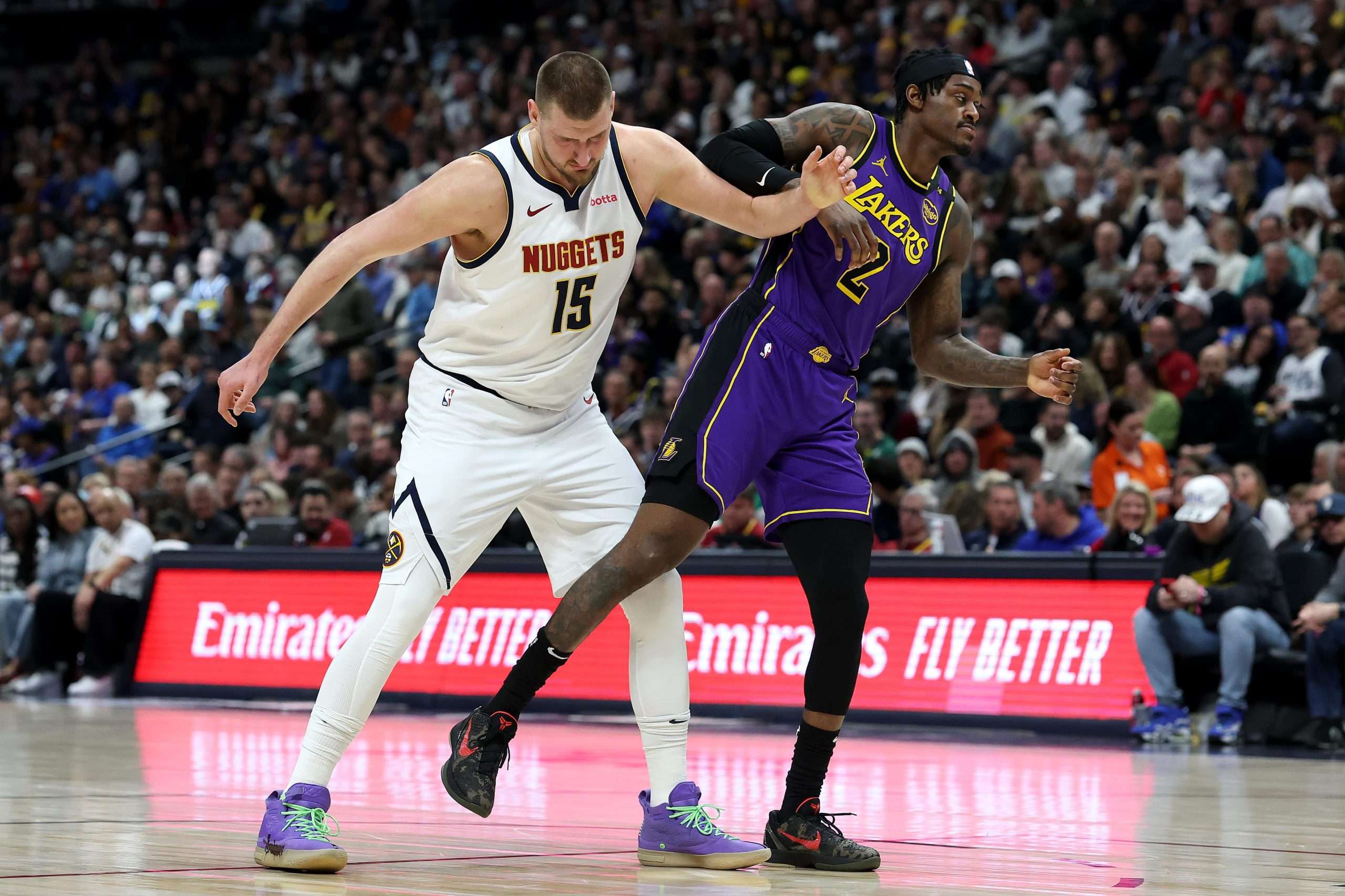 DENVER, COLORADO - FEBRUARY 22: Nikola Jokic #15 of the Denver Nuggets jockeys for position against Jarred Vanderbilt #2 of the Los Angels Lakers in the first quarter at Ball Arena on February 22, 2025 in Denver, Colorado. NOTE TO USER: User expressly acknowledges and agrees that, by downloading and or using this photograph, User is consenting to the terms and conditions of the Getty Images License Agreement. (Photo by Matthew Stockman/Getty Images)