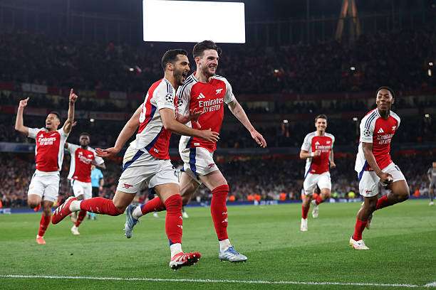 LONDON, ENGLAND - APRIL 8: Mikel Merino of Arsenal celebrates after scoring a goal to make it 3-0 during the UEFA Champions League 2024/25 Quarter Final First Leg match between Arsenal FC and Real Madrid C.F. at Arsenal Stadium on April 8, 2025 in London, England. (Photo by Catherine Ivill - AMA/Getty Images)