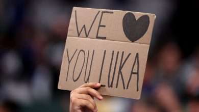 DALLAS, TEXAS - APRIL 09: A fan holds a sign in honor of Luka Doncic #77 of the Los Angeles Lakers before the game against the Dallas Mavericks at American Airlines Center on April 09, 2025 in Dallas, Texas. NOTE TO USER: User expressly acknowledges and agrees that, by downloading and or using this photograph, user is consenting to the terms and conditions of the Getty Images License Agreement. (Photo by Sam Hodde/Getty Images)