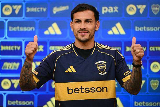 Argentina's Boca Juniors midfielder Leandro Paredes wears his new jersey during his presentation at La Bombonera Stadium in Buenos Aires on July 10, 2025. Argentine midfielder Leandro Paredes, World Cup champion in Qatar 2022, returned to Boca Juniors, the team where he began his career between 2010 and 2013, before embarking on a European tour that culminated weeks ago at AS Roma.