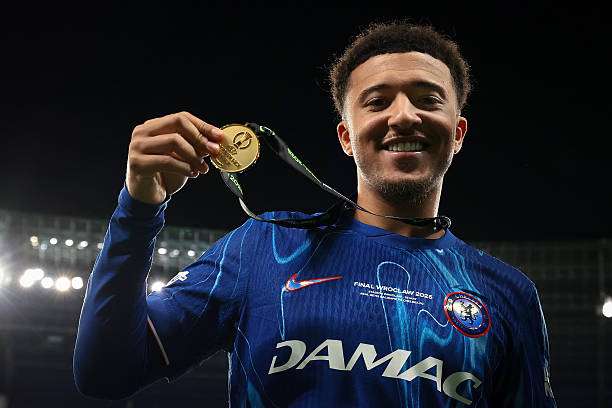 WROCLAW, POLAND - MAY 28: Jadon Sancho of Chelsea FC poses with his Winners' medals following the 4-1 victory in the UEFA Conference League Final 2025 between Real Betis Balompie and Chelsea FC at Stadio Wroclaw on May 28, 2025 in Wroclaw, Poland. (Photo by Jonathan Moscrop/Getty Images)