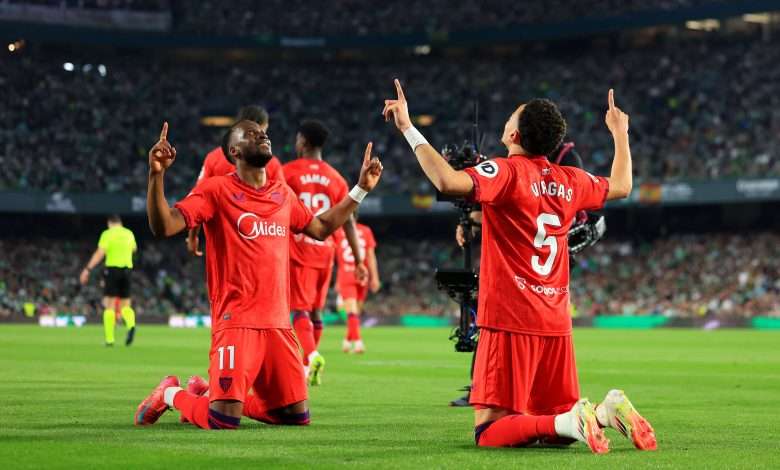 SEVILLE, SPAIN - MARCH 30: Ruben Vargas of Sevilla FC celebrates scoring his team's first goal with Dodi Lukebakio during the LaLiga match between Real Betis Balompie and Sevilla FC at Estadio Benito Villamarin on March 30, 2025 in Seville, Spain. (Photo by Fran Santiago/Getty Images)