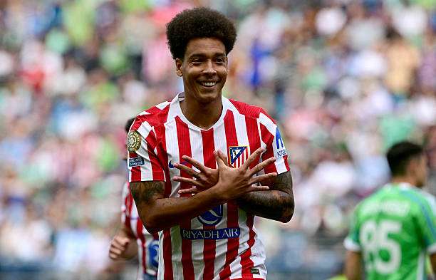 TOPSHOT - Atletico Madrid's Belgian midfielder #20 Axel Witsel celebrates scoring his team's second goal during the FIFA Club World Cup 2025 Group B football match between US Seattle Sounders and Spain's Atletico de Madrid at the Lumen Field stadium in Seattle on June 19, 2025