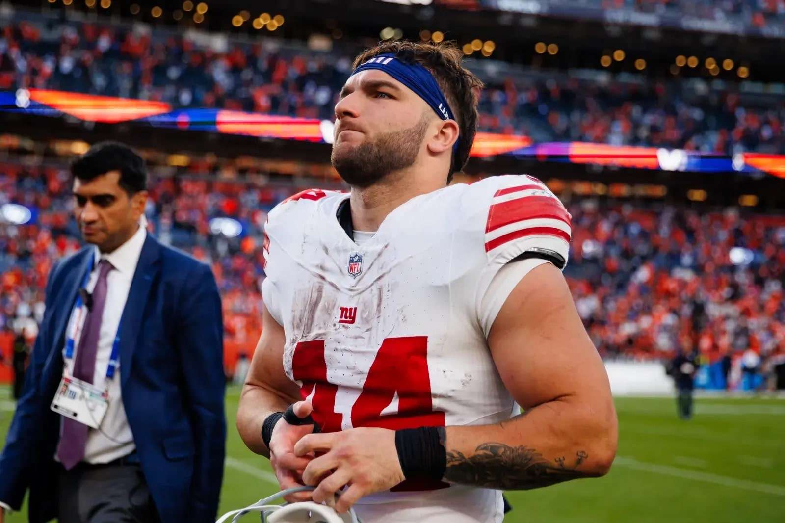 Cam Skattebo #44 of the New York Giants walks on the field after the 32-33 loss to the Denver Broncos at Empower Field at Mile High on October 19, 202...Read More | (Photo by Justin Edmonds/Getty Images)