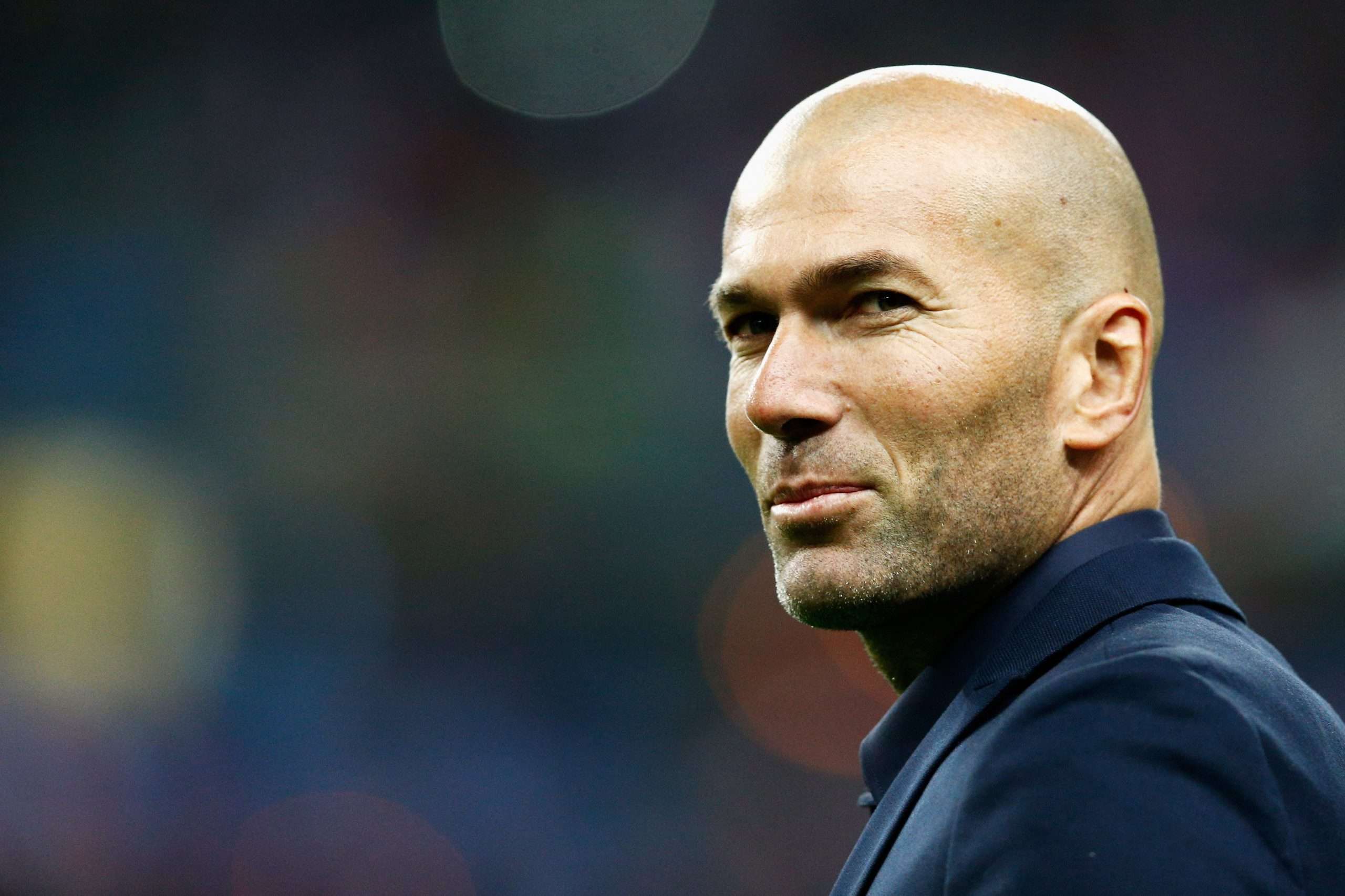 PARIS, FRANCE - MARCH 26: Former French international, Zinedine Zidane walks on the field prior to the International Friendly match between France and Brazil at the Stade de France on March 26, 2015 in Paris, France. (Photo by Dean Mouhtaropoulos/Getty Images)