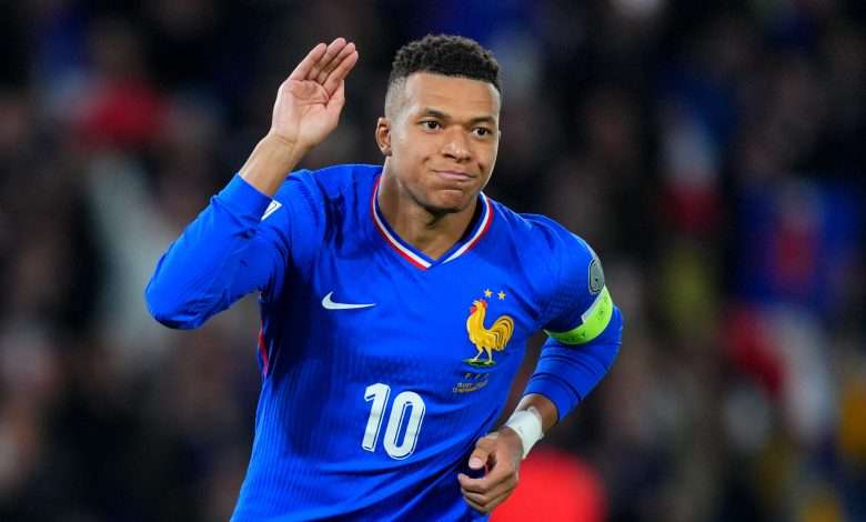 Kylian Mbappe of France celebrates scoring his team's first goal from the penalty spot during the FIFA World Cup 2026 qualifier match between France and Ukraine at Parc des Princes on November 13, 2025 in Paris, France. (Photo by Franco Arland/Getty Images)