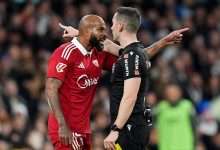 Marcao of Sevilla FC reacts after he is sent off by Referee, Alejandro Muniz, after receiving a second yellow card, during the LaLiga EA Sports match between Real Madrid CF and Sevilla FC at Estadio Santiago Bernabeu on December 20, 2025 in Madrid, Spain. (Photo by Angel Martinez/Getty Images)