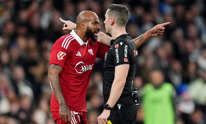 Marcao of Sevilla FC reacts after he is sent off by Referee, Alejandro Muniz, after receiving a second yellow card, during the LaLiga EA Sports match between Real Madrid CF and Sevilla FC at Estadio Santiago Bernabeu on December 20, 2025 in Madrid, Spain. (Photo by Angel Martinez/Getty Images)