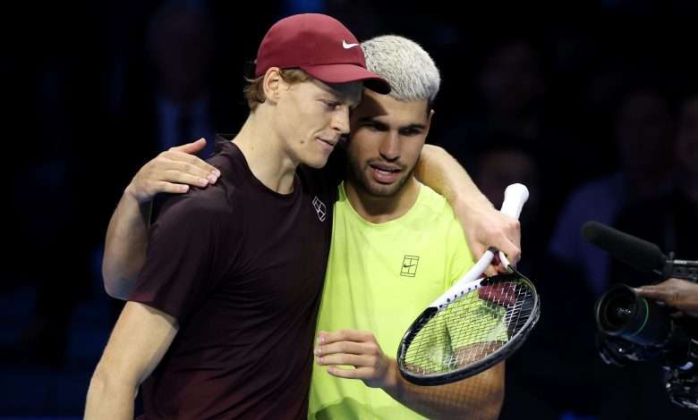Jannik Sinner of Italy hugs Carlos Alcaraz of Spain following the Men's Singles Final on day eight of the Nitto ATP Finals 2025 at Inalpi Arena on November 16, 2025 in Turin, Italy. (Photo by Clive Brunskill/Getty Images)