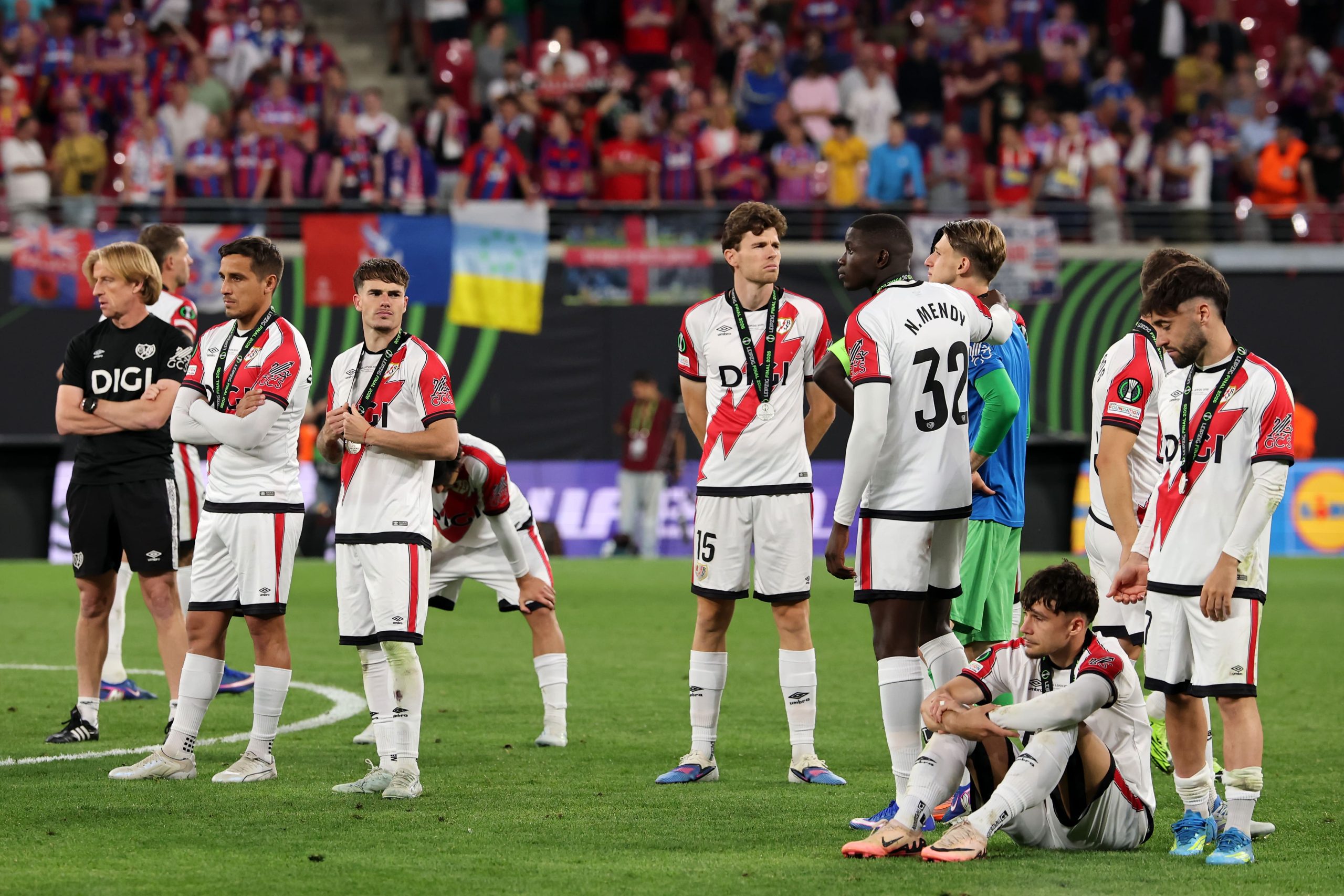Players of Rayo Vallecano look dejected after collecting their runners up medals following the UEFA Conference League Final 2026 match between Crystal Palace FC and Rayo Vallecano de Madrid at Football Arena Leipzig on May 27, 2026 in Leipzig, Germany. (Photo by Alex Grimm/Getty Images)