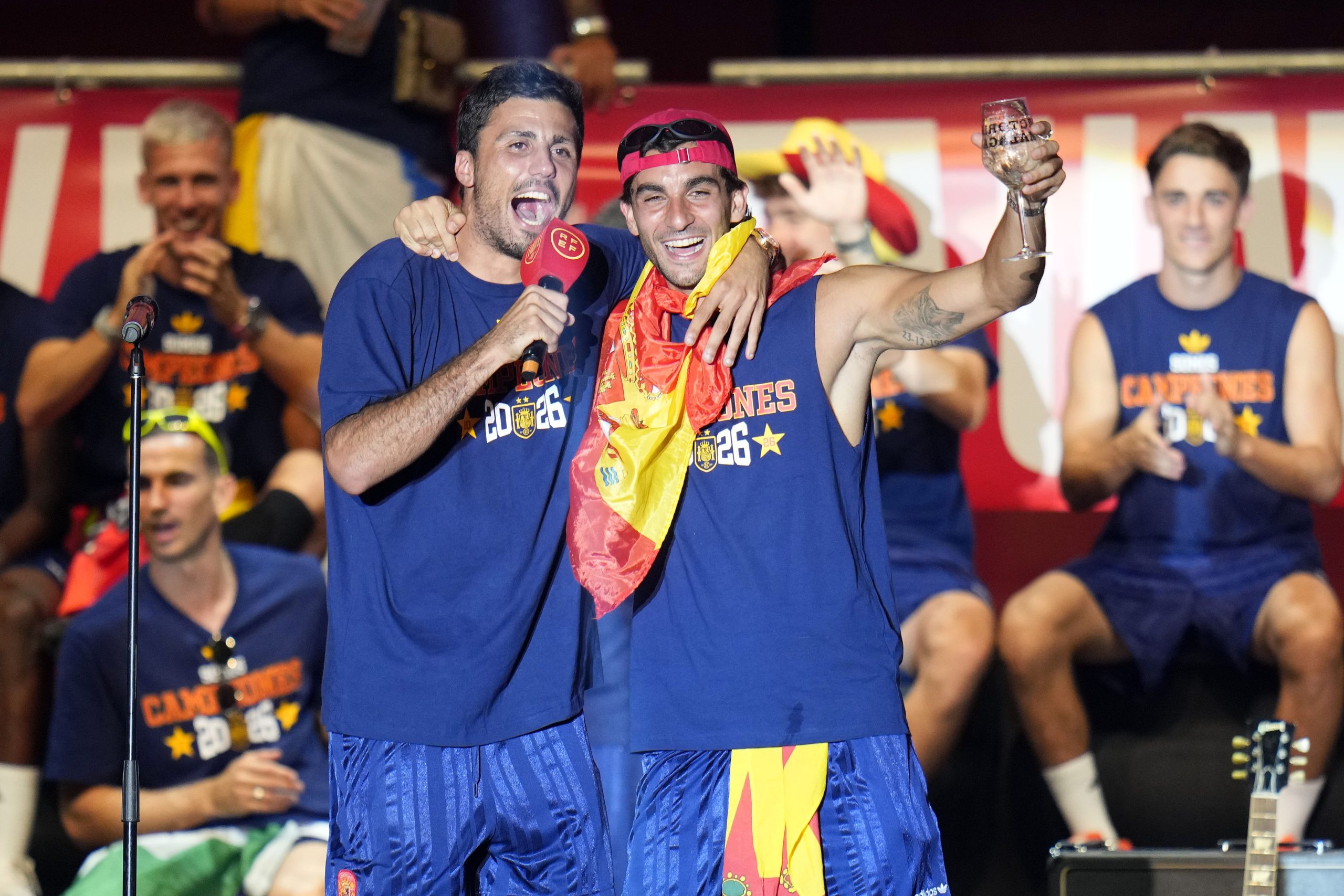 Rodri and Ferran Torres of Spain celebrate on stage during the FIFA World Cup 2026 Trophy parade on July 20, 2026 in Madrid, Spain. The final match of the FIFA World Cup 2026 was held at New York New Jersey Stadium in New Jersey between Spain and Argentina. (Photo by Diego Souto/Getty Images)