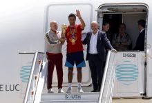 Luis de la Fuente, Head Coach of Spain, Rodri of Spain and Rafael Louzan, Spain Football Association President, pose with the trophy as the Spanish team arrive at Adolfo Suarez Madrid–Barajas Airport ahead of the FIFA World Cup 2026 Trophy parade on July 20, 2026 in Madrid, Spain. The final match of the FIFA World Cup 2026 was held at New York New Jersey Stadium in New Jersey between Spain and Argentina. (Photo by Pablo Blazquez Dominguez/Getty Images)