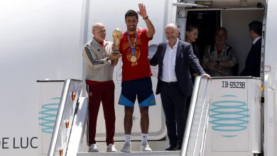 Luis de la Fuente, Head Coach of Spain, Rodri of Spain and Rafael Louzan, Spain Football Association President, pose with the trophy as the Spanish team arrive at Adolfo Suarez Madrid–Barajas Airport ahead of the FIFA World Cup 2026 Trophy parade on July 20, 2026 in Madrid, Spain. The final match of the FIFA World Cup 2026 was held at New York New Jersey Stadium in New Jersey between Spain and Argentina. (Photo by Pablo Blazquez Dominguez/Getty Images)