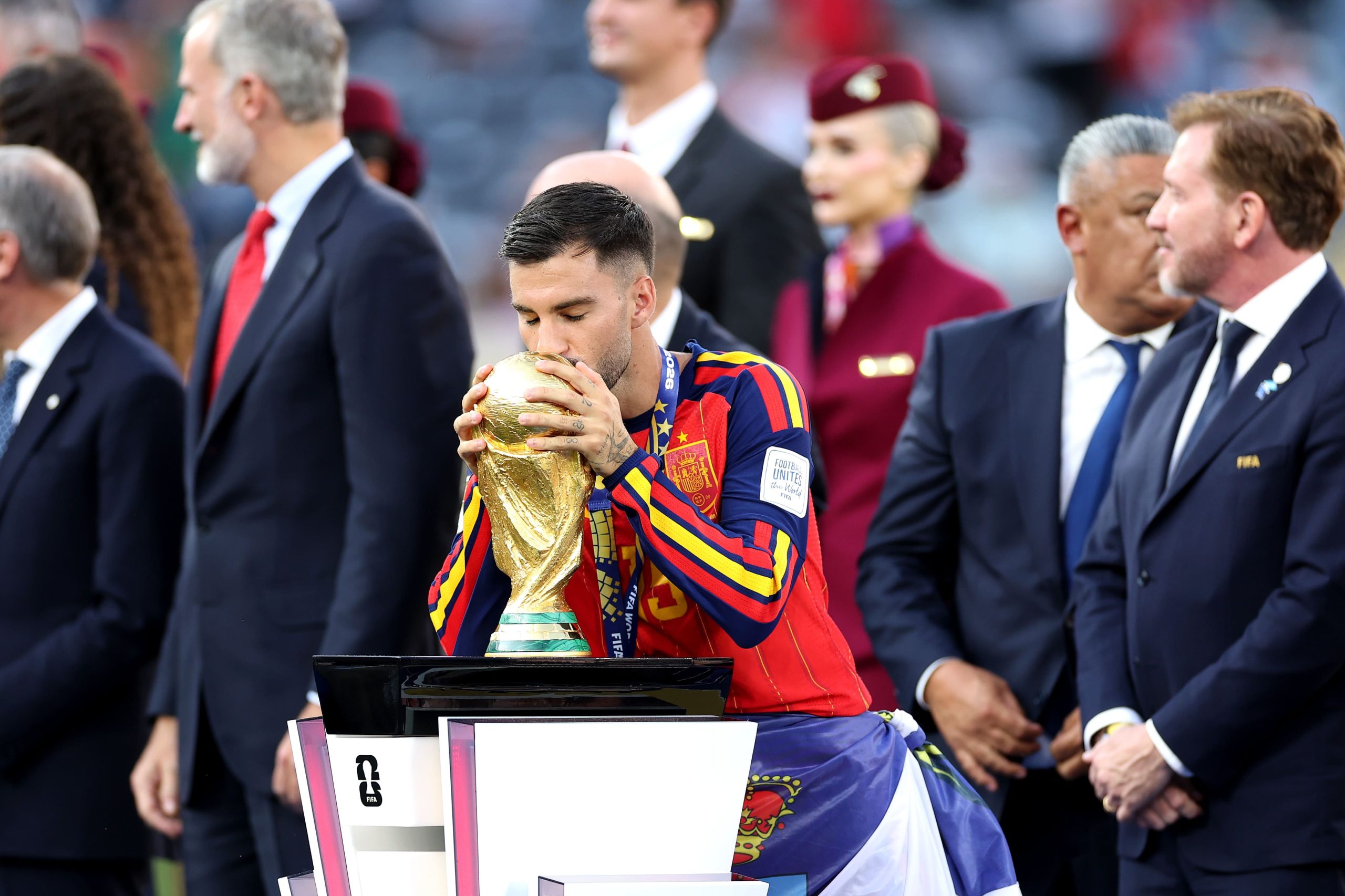 Alex Baena #15 of Spain kisses the FIFA World Cup Winner's Trophy as he receives the medal following the FIFA World Cup 2026 Final match between Spain and Argentina at New York New Jersey Stadium on July 19, 2026 in East Rutherford, New Jersey. (Photo by Dan Mullan/Getty Images)