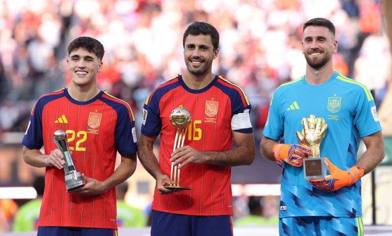 Pau Cubarsi #22, Rodri #16 and Unai Simon #23 of Spain pose with their awards after the FIFA World Cup 2026 Final match between Spain and Argentina at New York New Jersey Stadium on July 19, 2026 in East Rutherford, New Jersey. (Photo by Carl Recine/Getty Images)