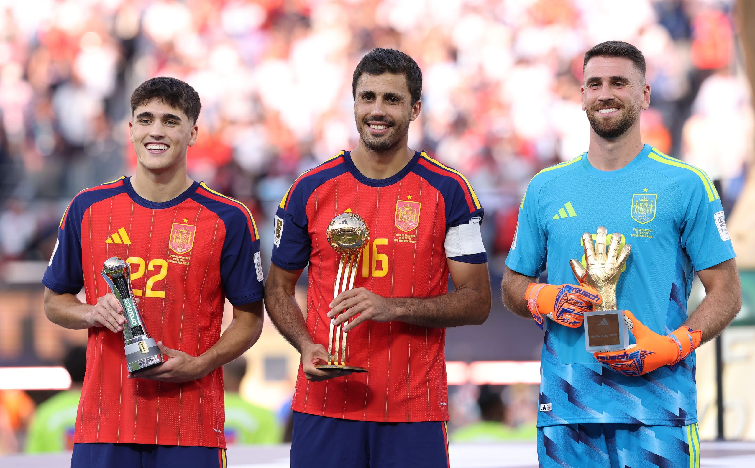 Pau Cubarsi #22, Rodri #16 and Unai Simon #23 of Spain pose with their awards after the FIFA World Cup 2026 Final match between Spain and Argentina at New York New Jersey Stadium on July 19, 2026 in East Rutherford, New Jersey. (Photo by Carl Recine/Getty Images)