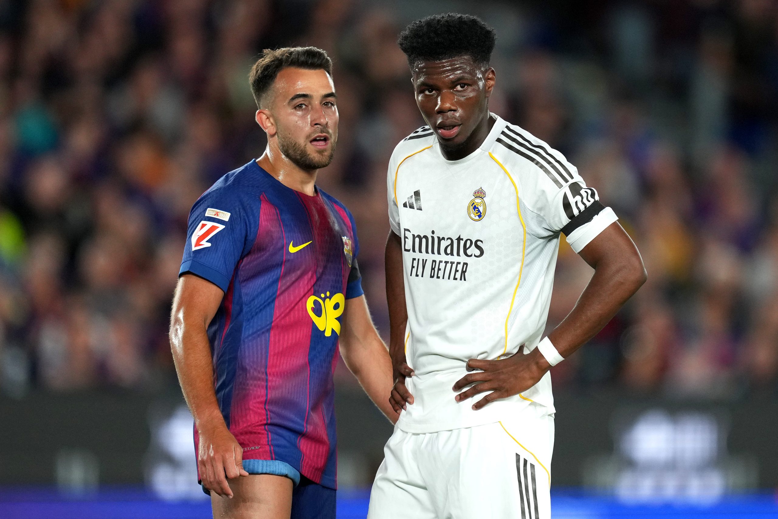 Eric Garcia of FC Barcelona marks Aurelien Tchouameni of Real Madrid during the LaLiga EA Sports match between FC Barcelona and Real Madrid CF at Spotify Camp Nou on May 10, 2026 in Barcelona, Spain. (Photo by Alex Caparros/Getty Images)