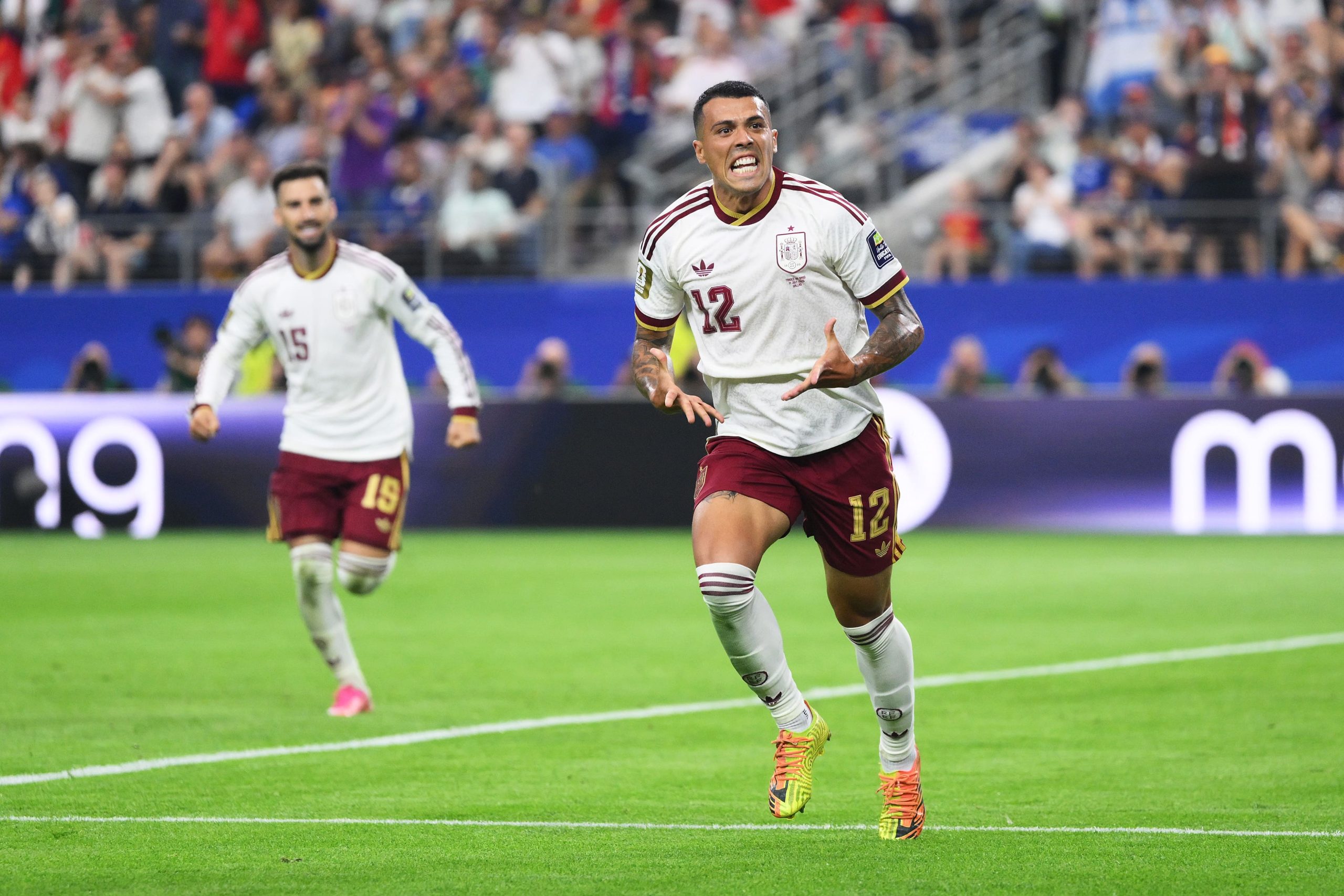 Pedro Porro #12 of Spain celebrates scoring his team's second goal during the FIFA World Cup 2026 Semi Final match between France and Spain at Dallas Stadium on July 14, 2026 in Arlington, Texas. (Photo by David Ramos/Getty Images)