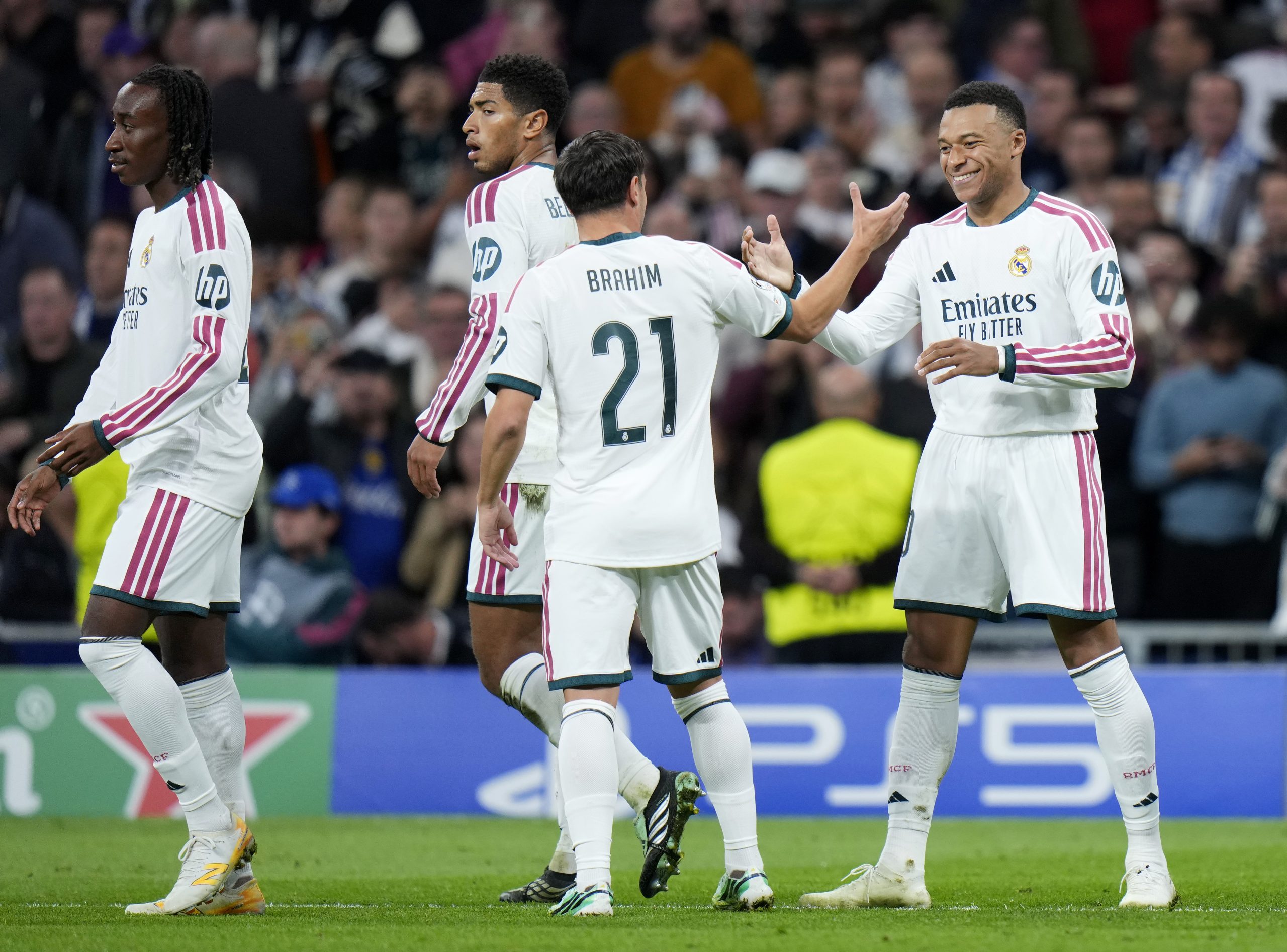 MADRID, SPAIN - OCTOBER 21: Yan Diomande of Real Madrid celebrates scoring his team’s fourth goal with Kylian Mbappe and Brahim Diaz during the UEFA Champions League 2026/27 League Phase MD3 match between Real Madrid C.F. and RB Leipzig at Estadio Santiago Bernabeu on October 21, 2026 in Madrid, Spain. (Photo by Diego Souto/Getty Images)